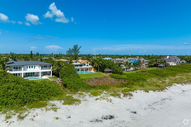 Multi-level homes line Melbourne Beach’s quiet oceanfront streets.