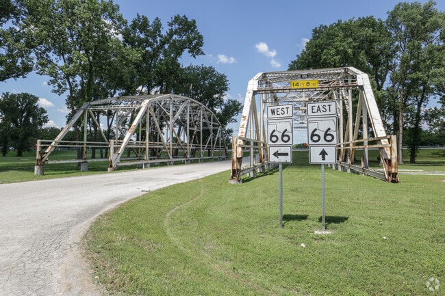 Kids can walk through the preserved bridge structures at Rogers Point Park.