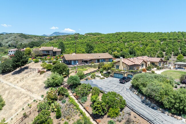 Mansions border orchards in Capitan-Gaviota.