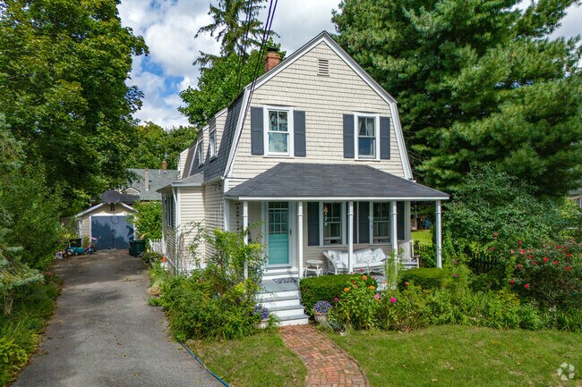 A colonial revival home in the Annawomscutt neighborhood has elements of Dutch style.