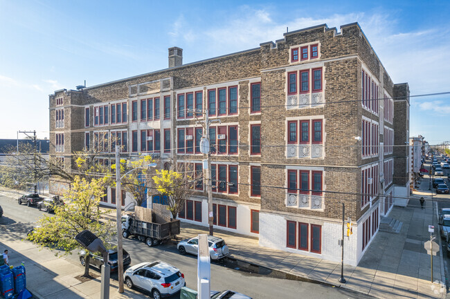 The Kirkbride School was built in 1926 in a Late Gothic Revival style.