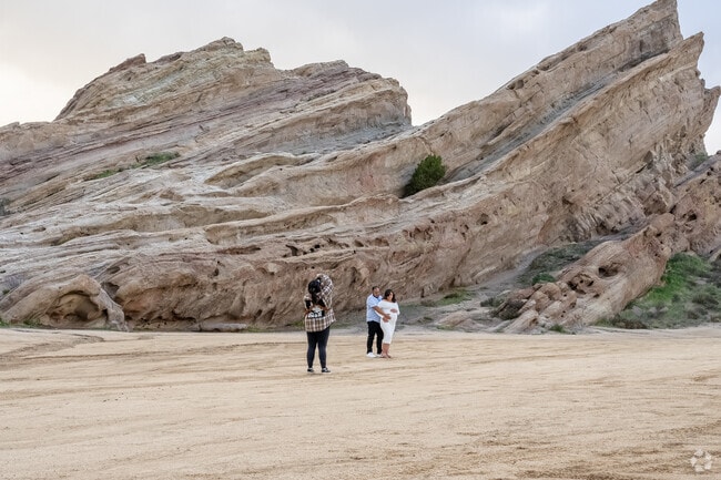 A couple have their maternity shoot at Vasquez Rocks in Agua Dulce.