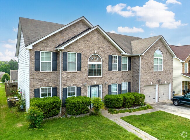 Irondale has large mini mansions with two car garages and lush landscaping.