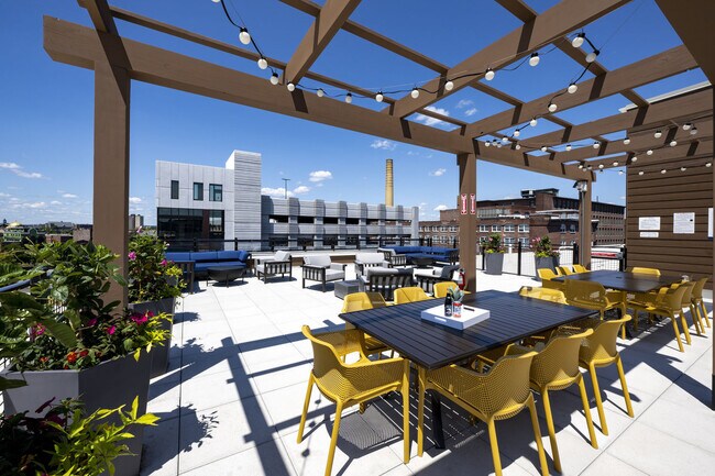 Rooftop Terrace With Seating And Pergola
