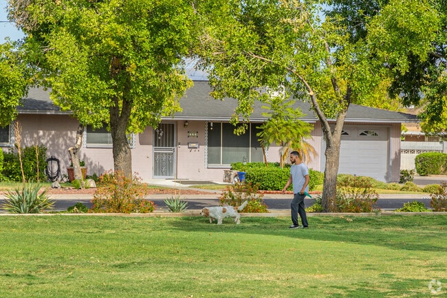 The local residents walk with their pets at Loma Linda Park.