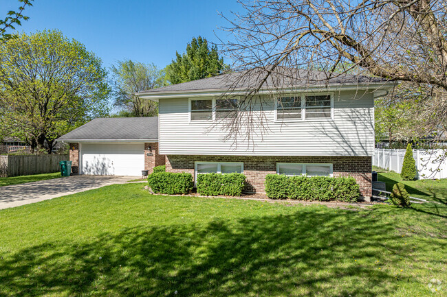 Split-level homes with neatly trimmed hedges can be found in West Plainfield.