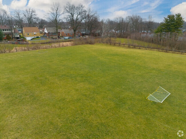 Midway Elementary School has a soccer field for students near the back of the building.