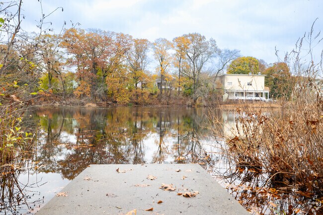 Homes along the Woonasquatucket River in Allendale-Lymansville offer daily tranquility.