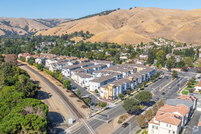 Wake up to breathtaking foothill views every day in Kimber-Gomes.