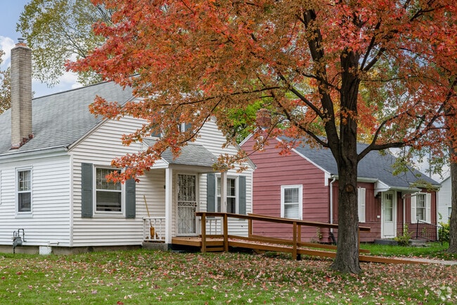 Find tree shaded homes with wood siding and covered porches in Harvester Community.
