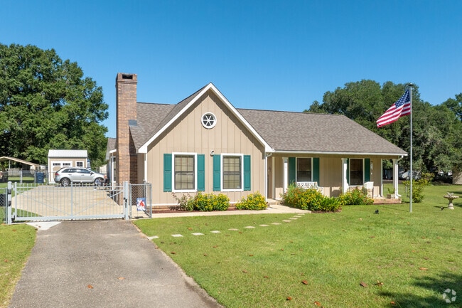 On the edges of Fairview farm house homes on large acreage of land can be found.