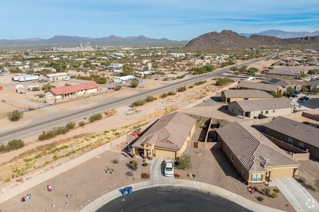 Manufactured ranch-style homes sit in the same neighborhoods in Marana.