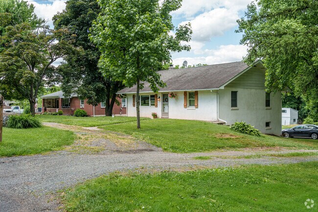 These older ranch homes sit on large lots set back from the road in East Coventry.