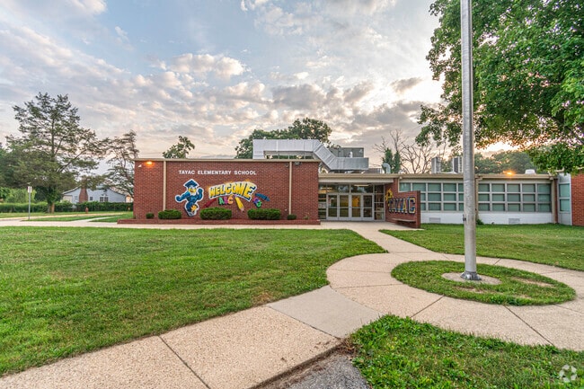 A cheery mural welcomes students at Tayac Elementary School in Friendly.