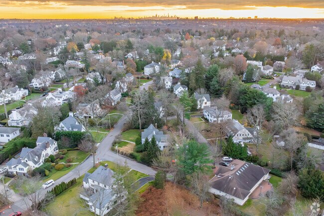 Sunset view of Tuckahow's residential area with NYC in the background.