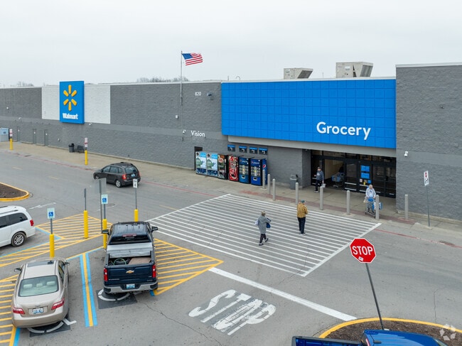 Richmond residents shop for fresh produce and home goods at Walmart.