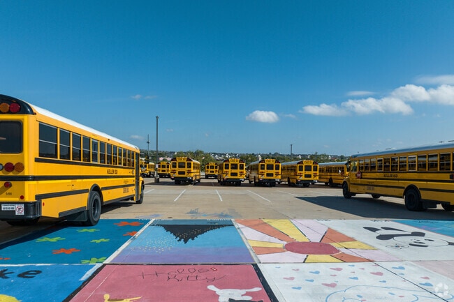 It takes a lot of busses to deliver 2000 students to their classes at Fossil Ridge High School.