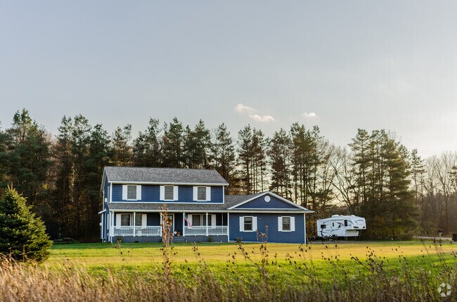 Rich Township, a rural farming community has many styles of homes, including this newer Colonial