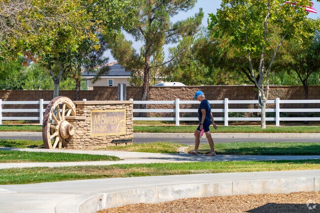 McSweeny Park entrance with lush landscaping and family-friendly amenities.