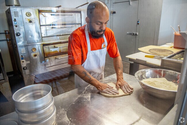 New York Pizza whips up East Coast style pies from scratch.