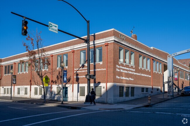 Walk past the Downtown School building in Winston-Salem.