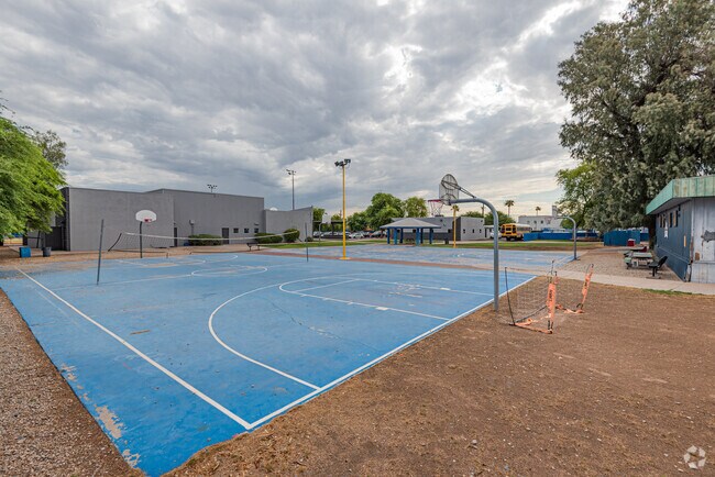 Basketball Courts at NFL Yet College Prep Academy / Reyes Maria Ruiz Leadership Academy.