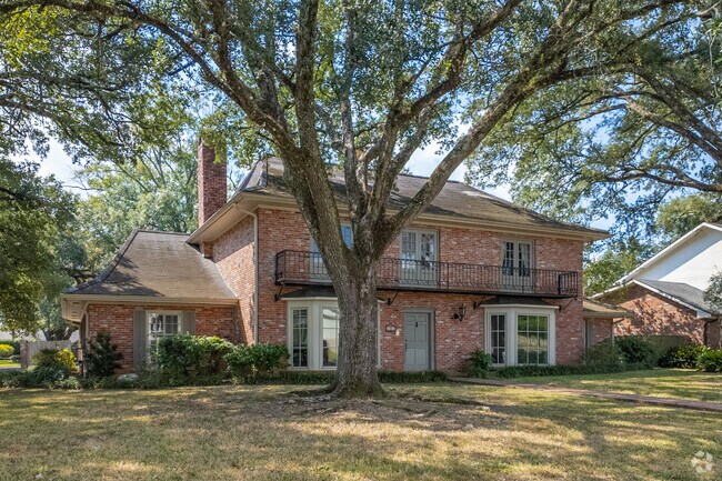 A Greenbriar two story brick home is pictured.
