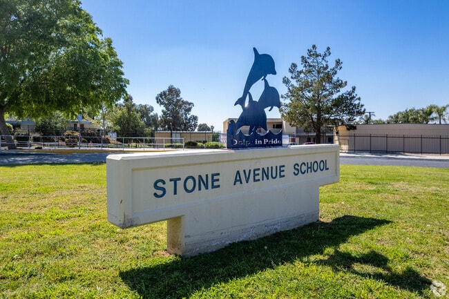 The entrance of Stone Avenue Elementary proudly showcases its name on a prominent signage.