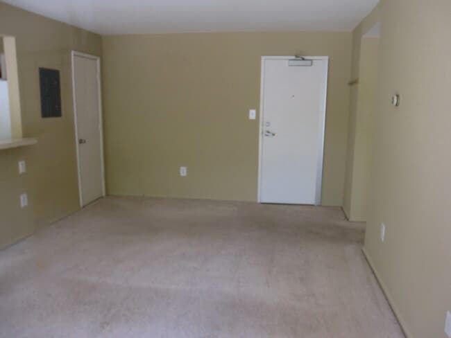 Living room with a coat room