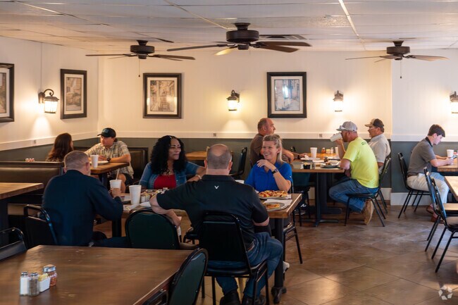 Grab your favorite pizza at Giuseppe's Cafe in Glen Iris.