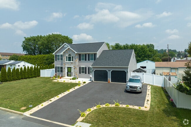 Hyde Park also has large Colonials, some with 2 car garages.