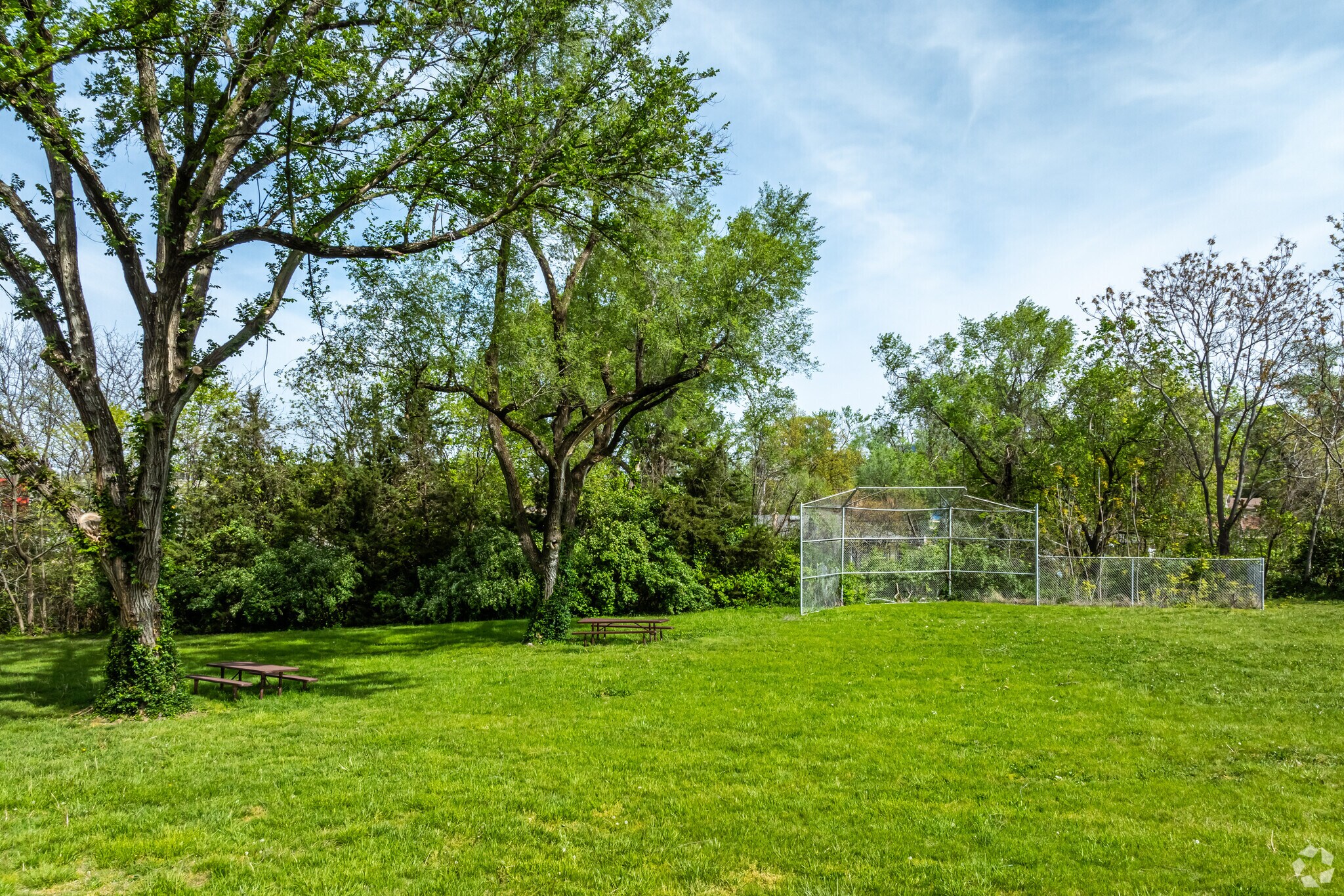 The private Fairlane Park is open to residents only & offers sports courts, tables, & a playset.