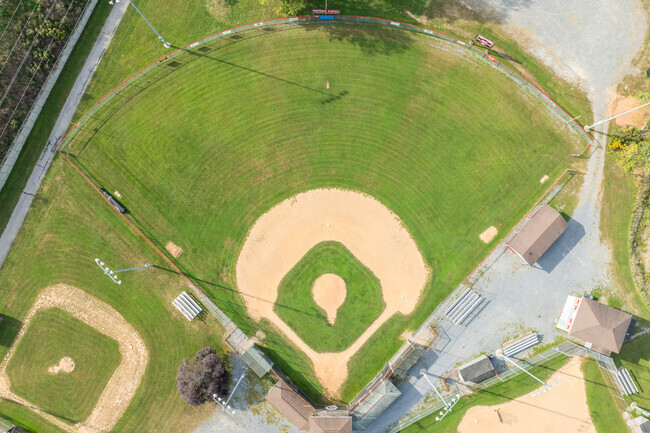 Carl E Stotz Park includes baseball and softball fields used by local teams.