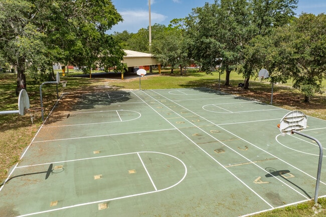 Kids enjoy outdoor play on the sports courts at West Pasco Education Academy.