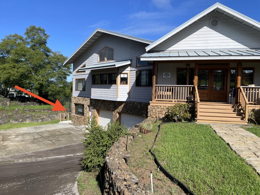 Front door into ohana from shared parking area and garage