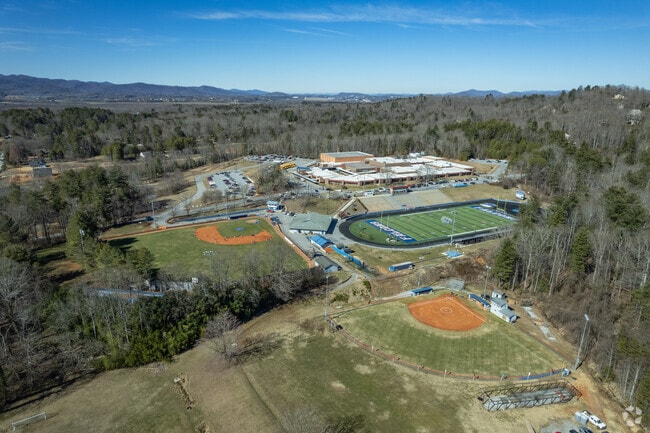 West Henderson High School has 2 baseball fields.