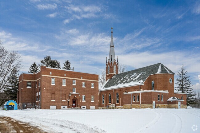 Ave Maria Academy sits next to St. John Baptist Catholic Church.