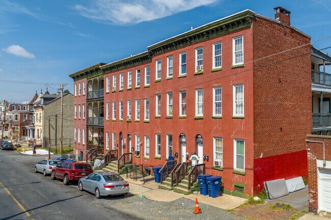 Classic brick townhomes in Reading Center City-Berks run right up to the sidewalk.