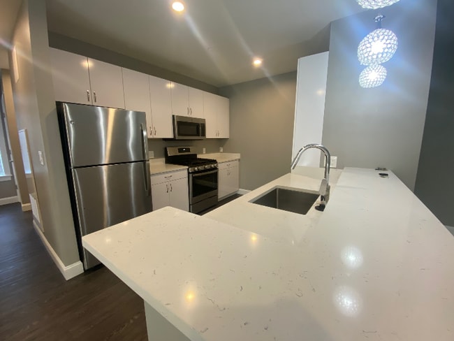 4945 Washington St unit 307, Boston, MA 02132 - photo 2