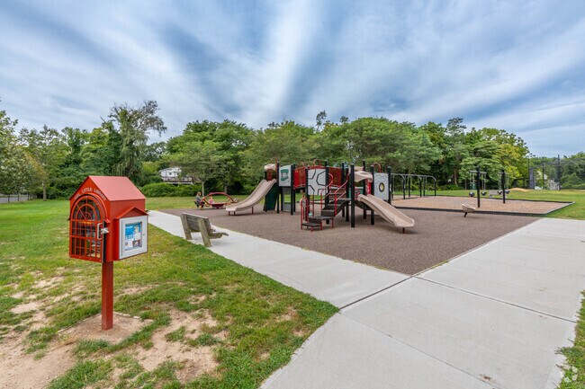 Beaver Dam Park offers a kid-friendly play area near homes in Islip Terrace.