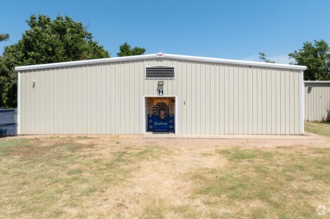 The back view of Lipan High School features the distinct Indians logo, reflecting school pride.