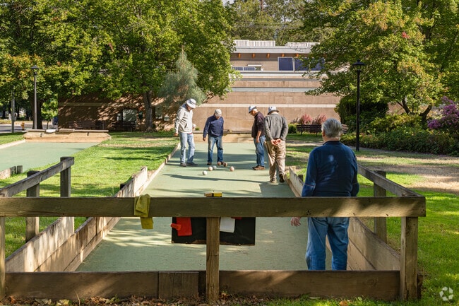 South Ashland friends meet every Tuesday to play a game of bocce ball in a local park.