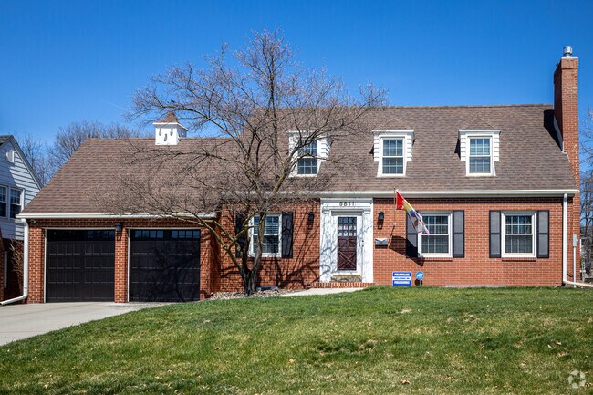 Waveland Woods features Cape Cod houses known for their compact design and classic appeal.