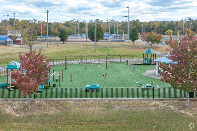 Play on the playground at Moody Municipal Park.