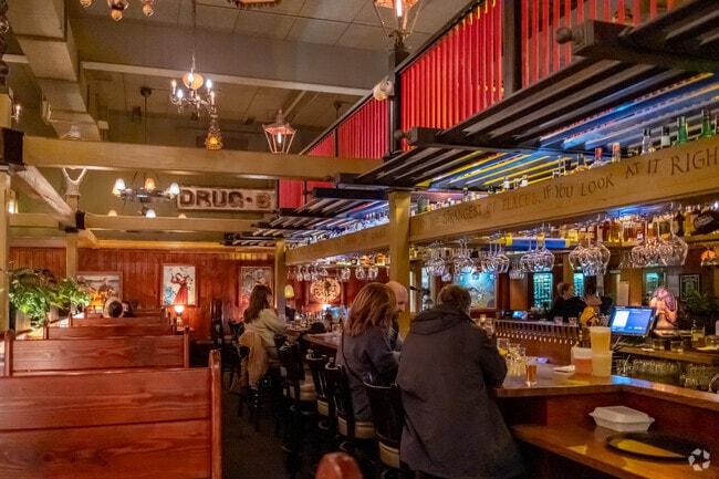 Meets friends over a refreshing beverage at McMenamins Tavern on the Square near Norway Hill.