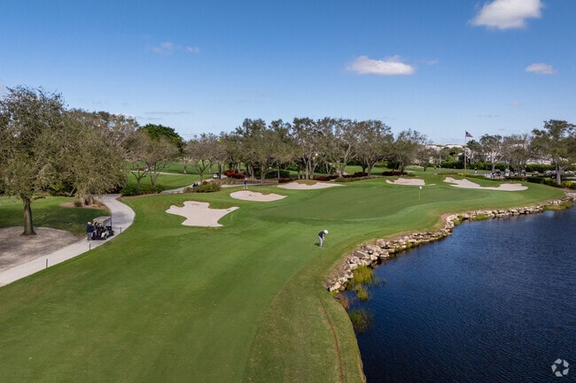 Pelican Bay Golf Club runs right through the center of the Pelican Bay neighborhood.