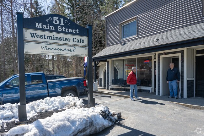 A few men talk outside Westminster Cafe.