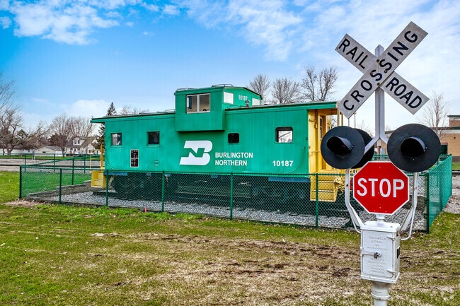 A Burlington train caboose serves as a museum at Central Park in Albertville.