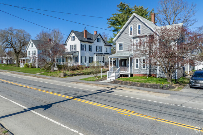 Colonial style multifamily homes can be found on Main St in Baldwinville.