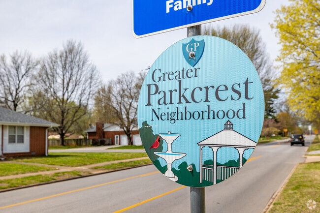 A Parkcrest sign marks the neighborhood entrance.